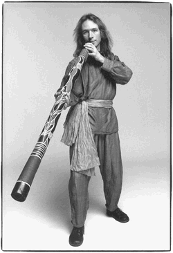 Kailash playing on a didgeridoo